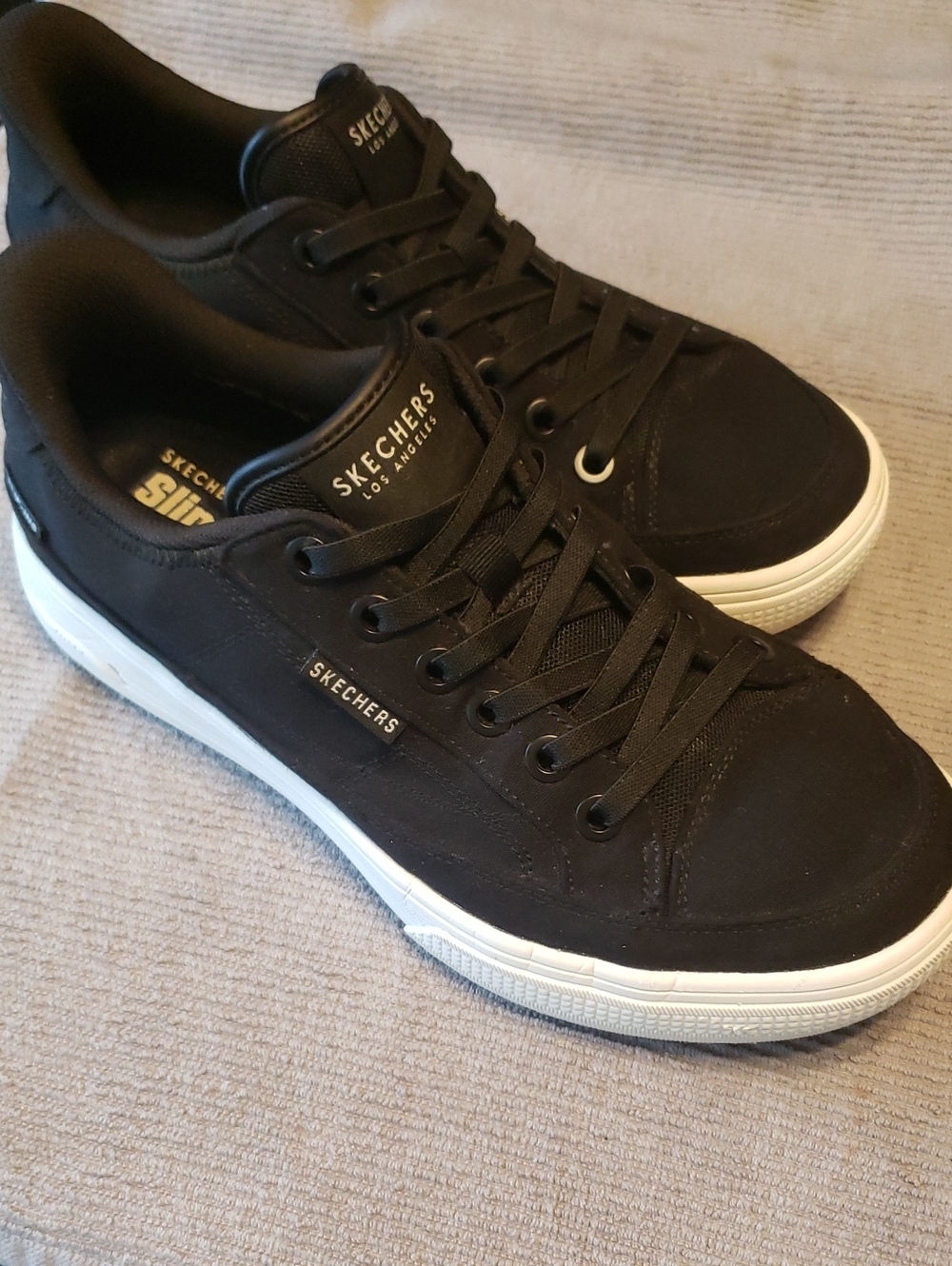 Skechers Women’s 9.5 Black Low-Top Sneakers with White Sole